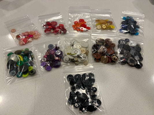 Little bag of used vintage and new buttons