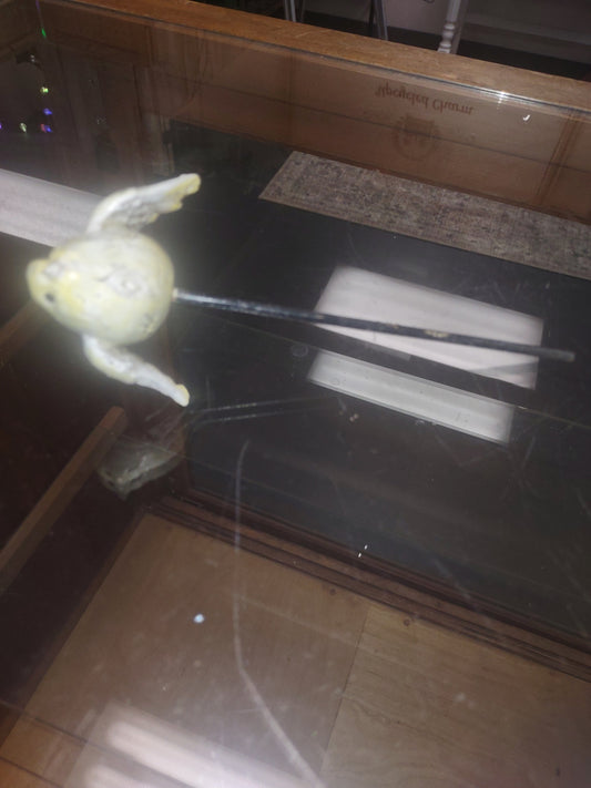 Bird on a rod