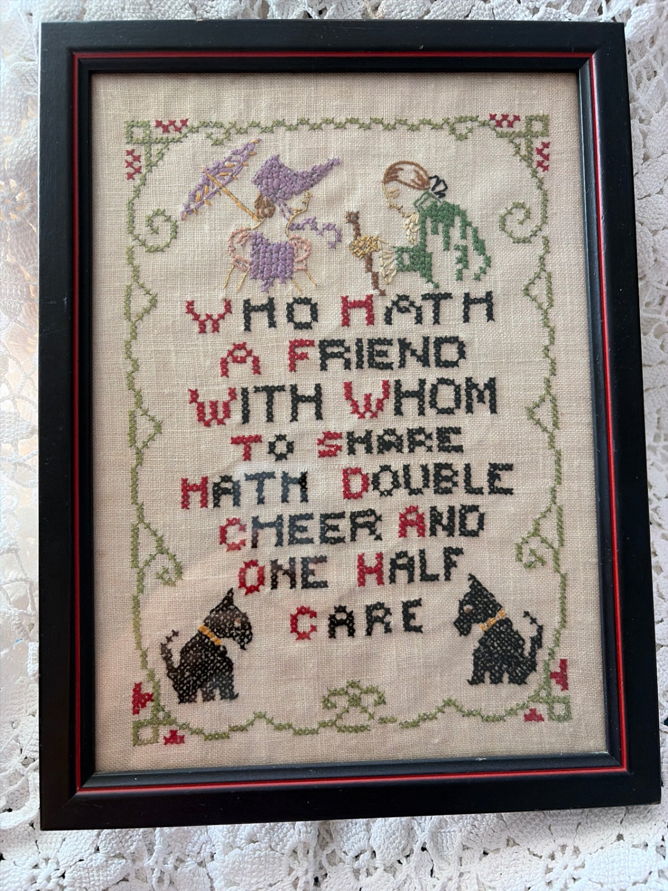 Cross-stitch in a frame. 