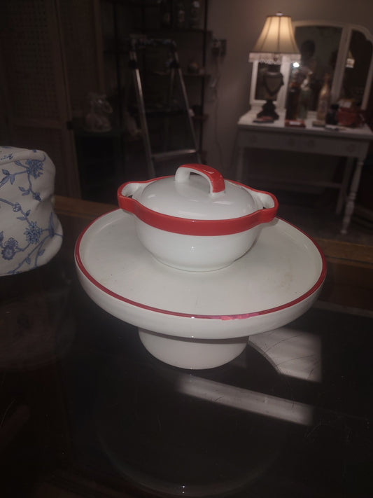 Small pot and riser,red rim.