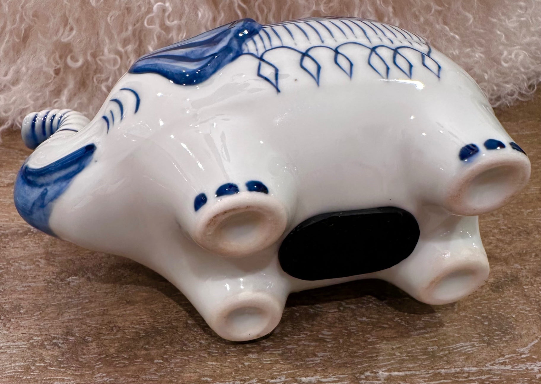 Blue and white ceramic elephant bank