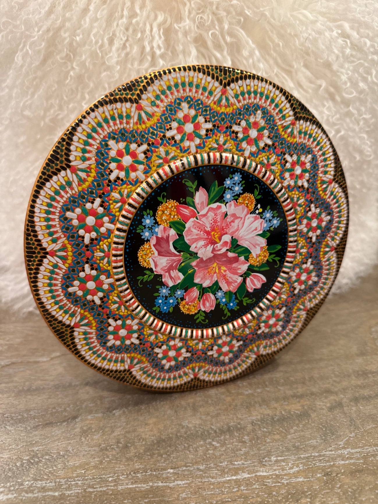 A vintage Daher embossed floral beaded metal tin England