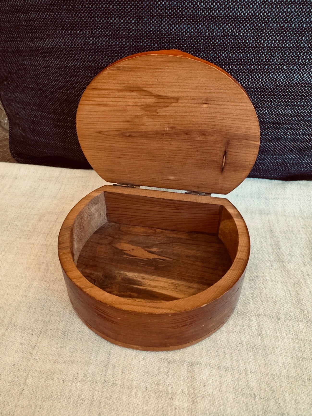 vintage half-moon or crescent-shaped cedar wood souvenir trinket box