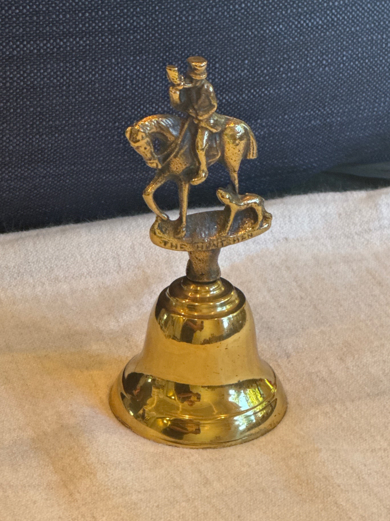 The hunt man brass bell