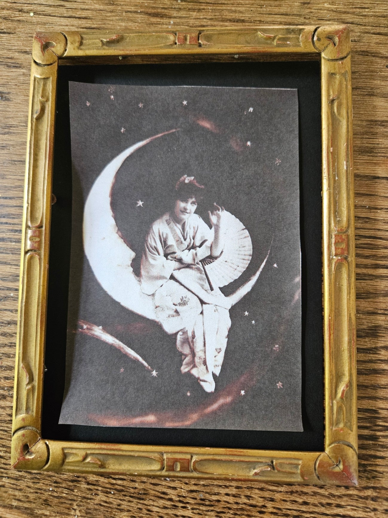 Small vint goldtone wood frame with pic of woman on moon