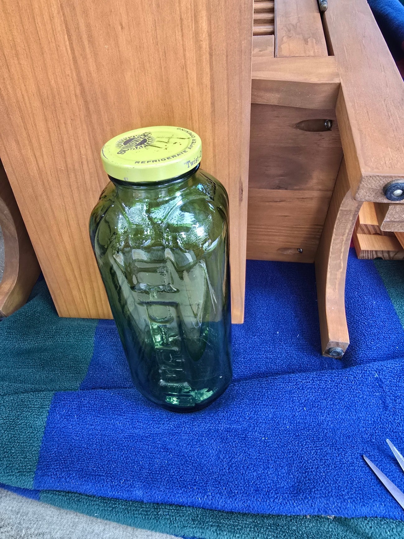 Green juice bottle with lid