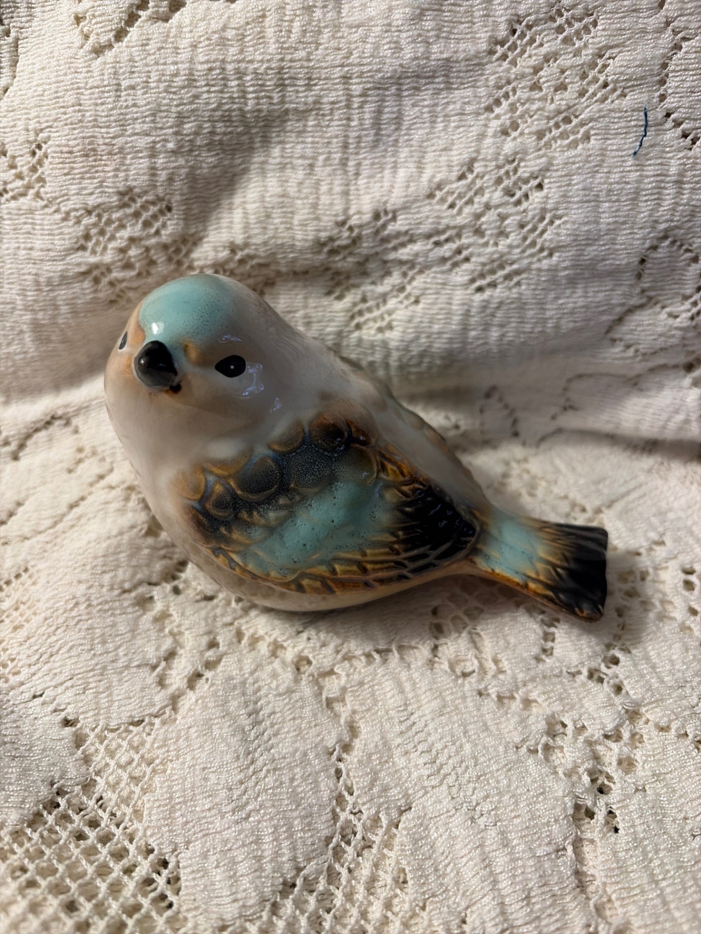 Ceramic beige and turquoise bird