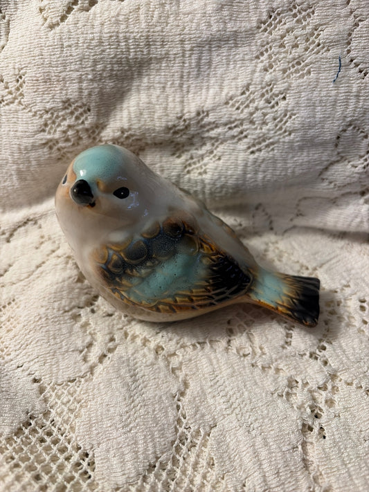Ceramic beige and turquoise bird