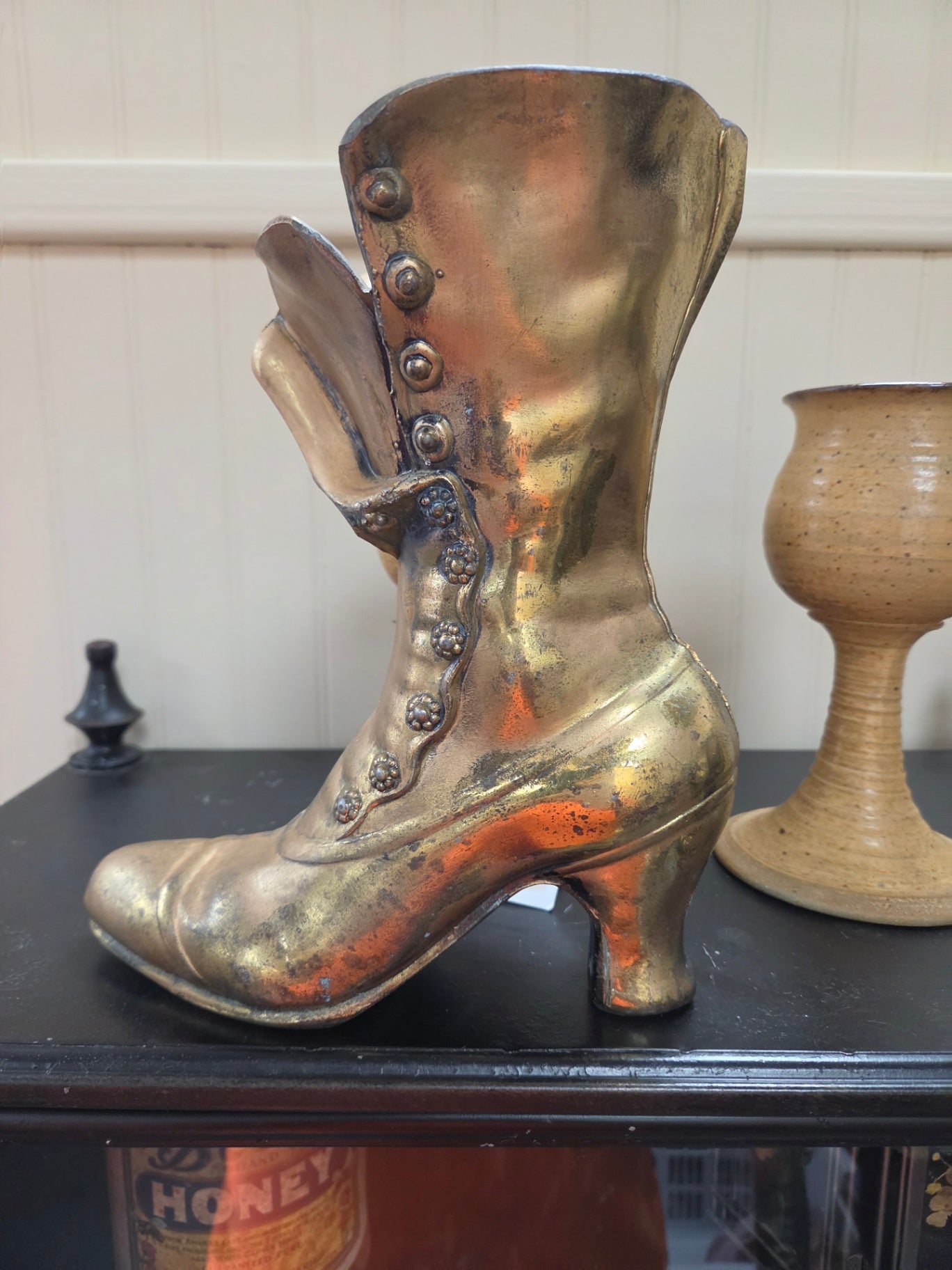 Brass boot