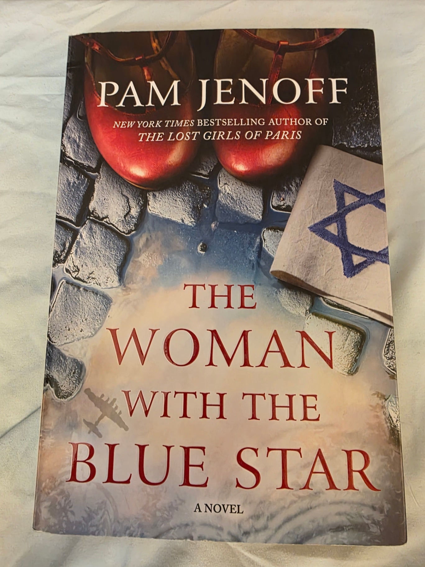 THE WOMAN WITH THE BLUE STAR
