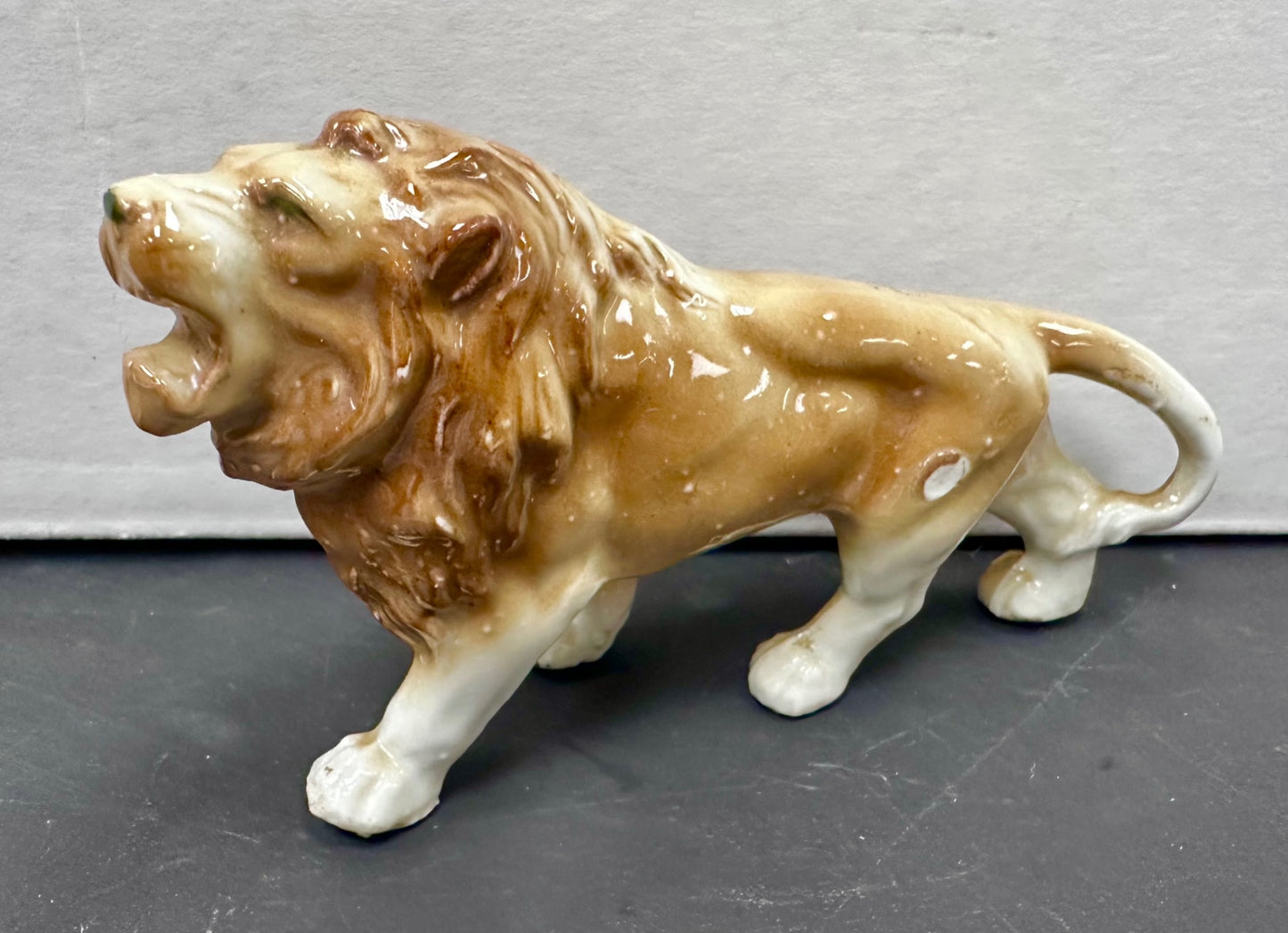 Small ceramic lion