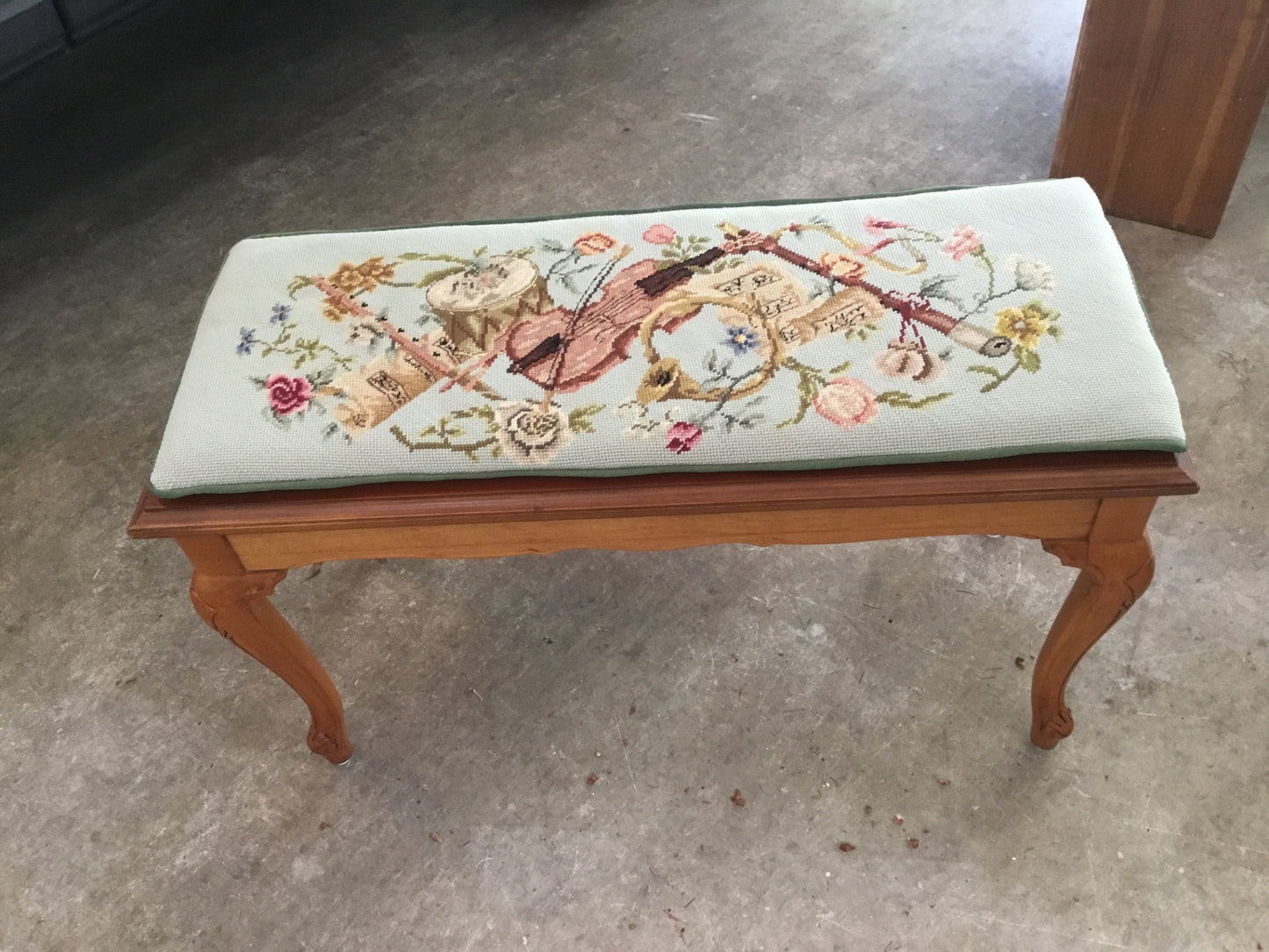 Piano bench with beautiful needlepoint seat cushion