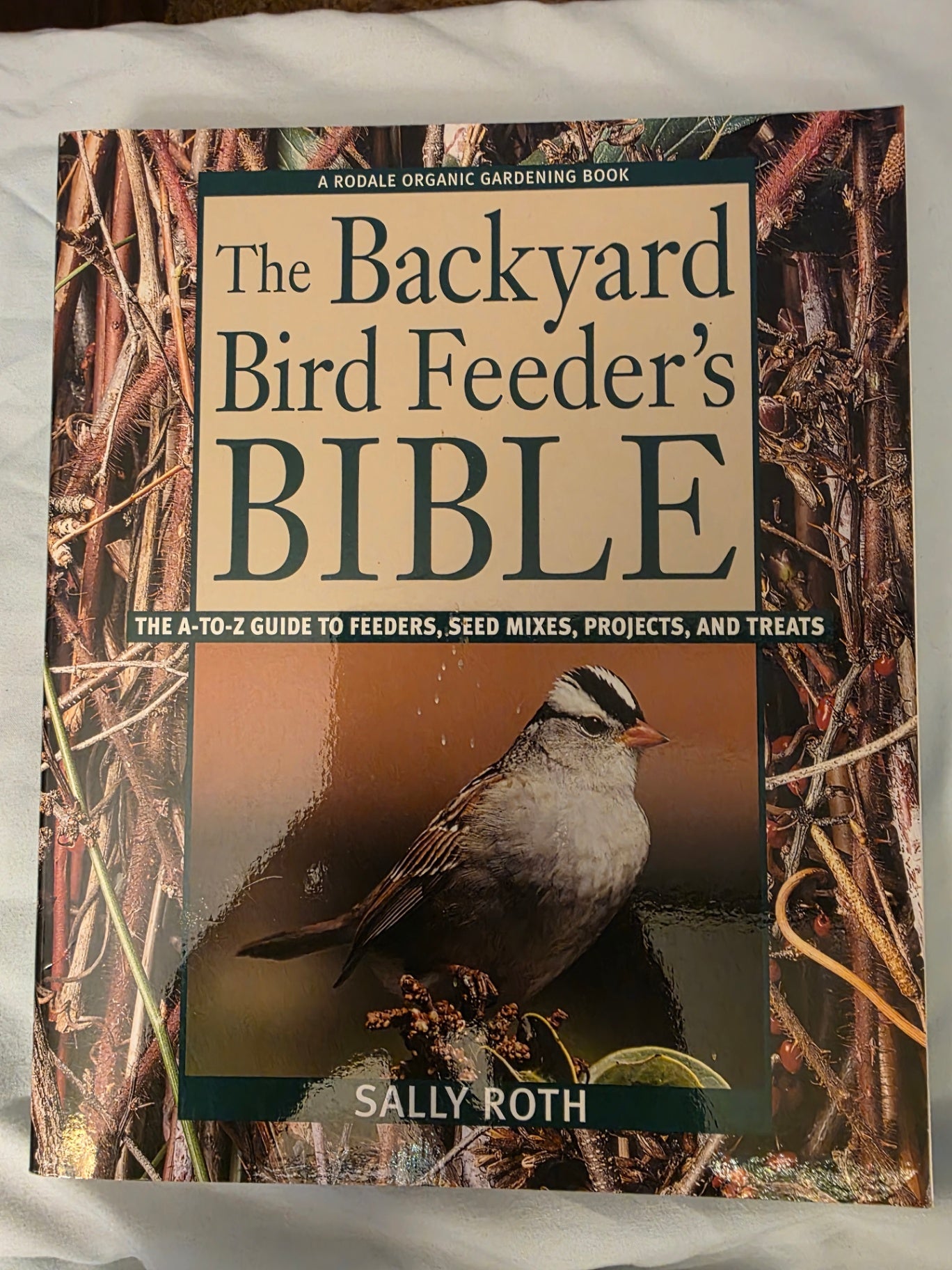 THE BACKYARD BIRD FEEDERS BIBLE.