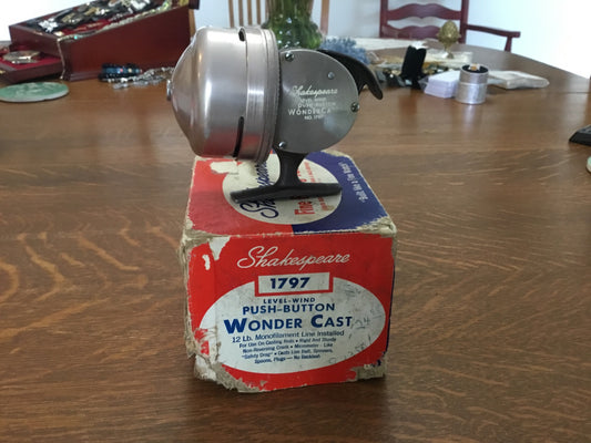 Shakesphere 1797 push button fishing reel w/box