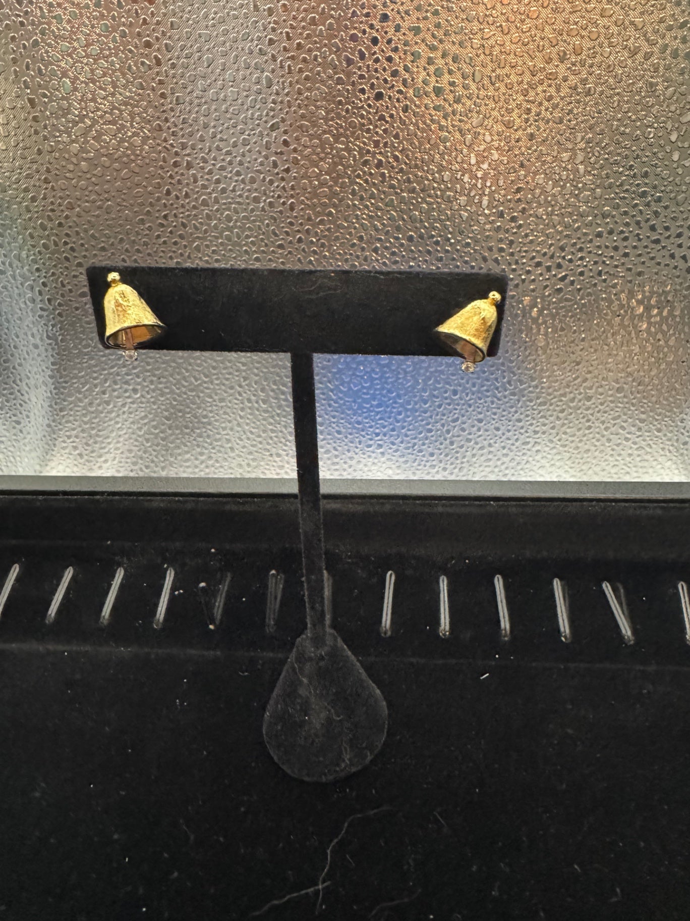 Gold tone Bell earrings with rhinestones.