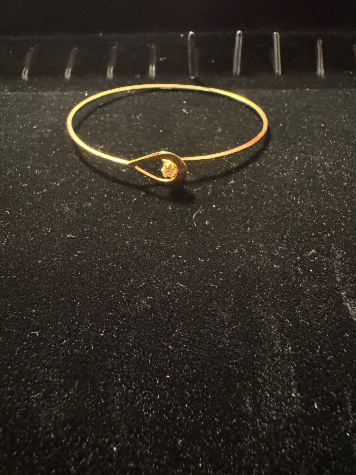 Gold tone bracelet with rhinestone 