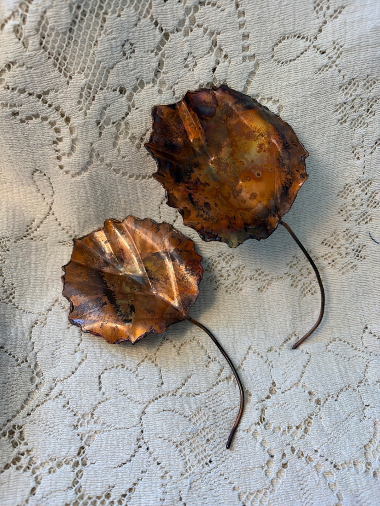 (2) copper colored metal leaves