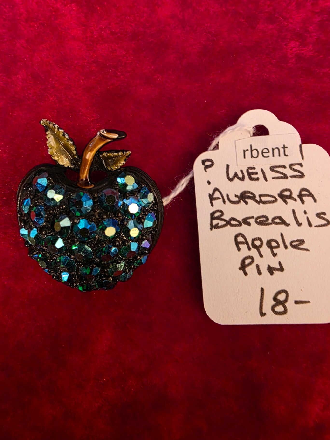 WEISS AURORA BOREALIS APPLE PIN?