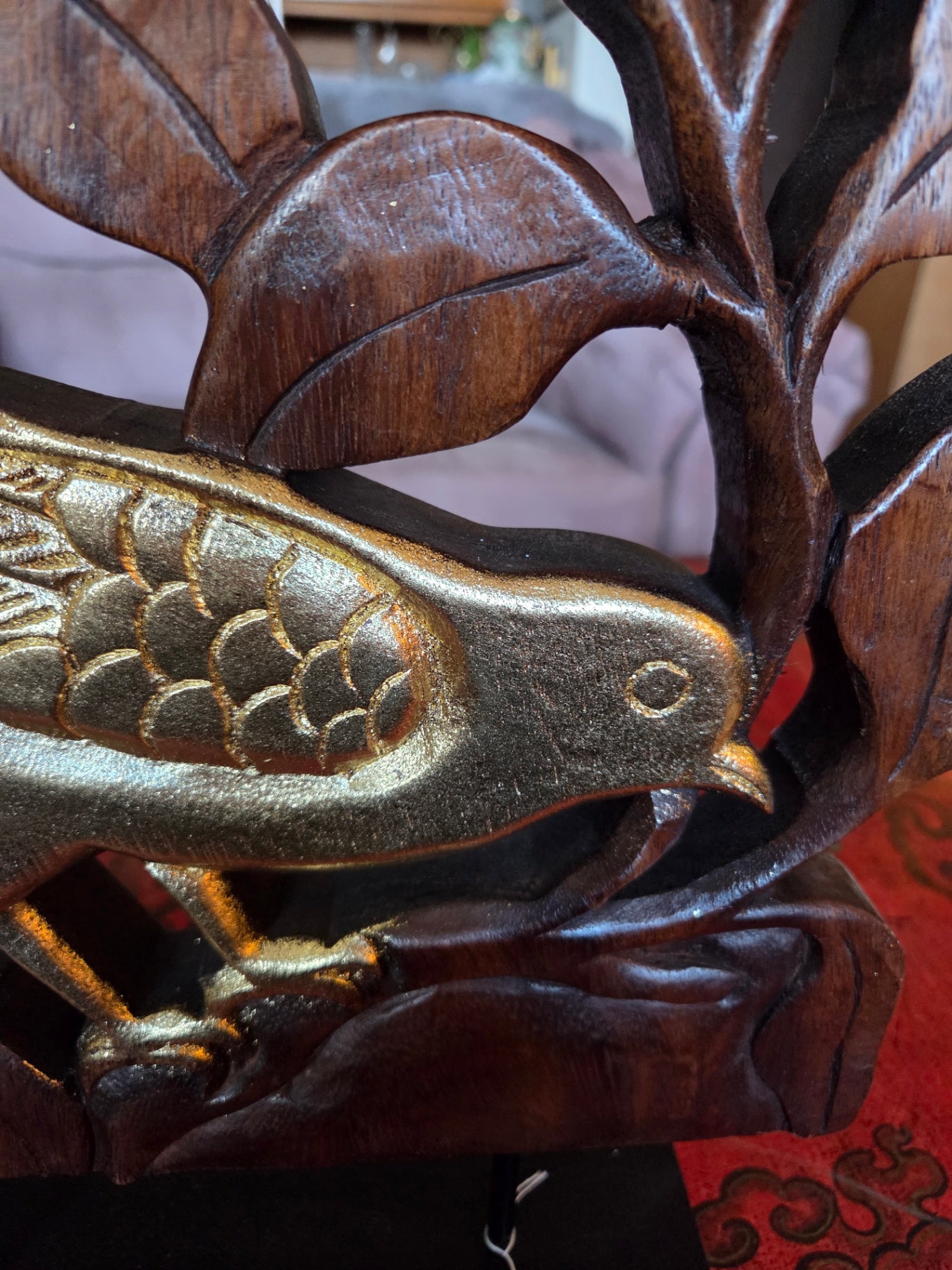 Hand carved teakwood bird