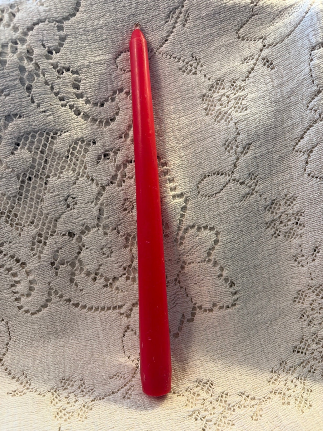 (1) 10” red tapered candle