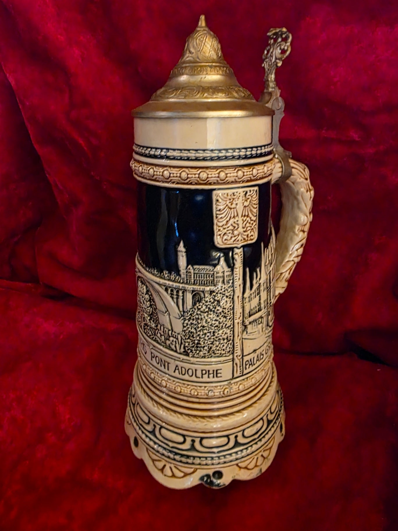 GERMAN LITED STEIN WITH SWISS MUSICAL MOVEMENT.