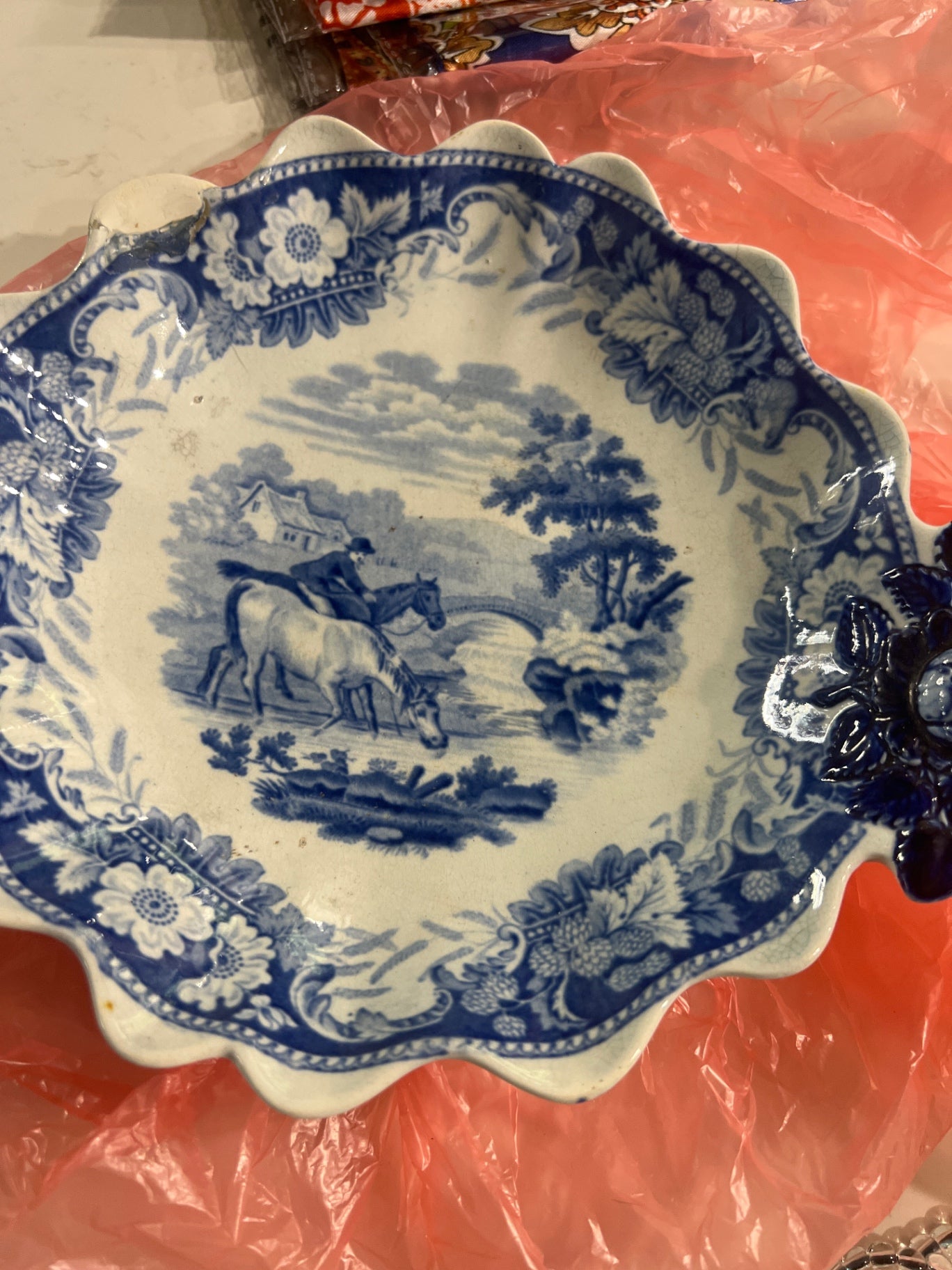 Blue and white dish with horses 