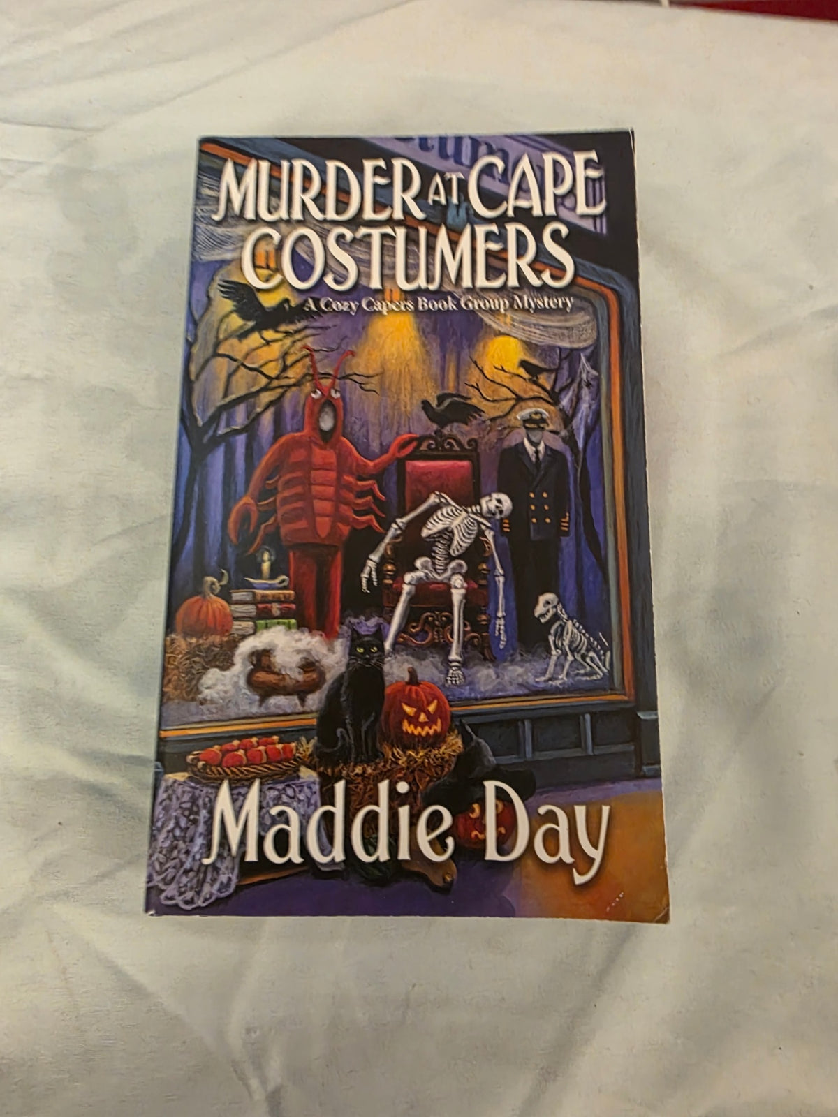 MURDER AT CAPE COSTUMERS.