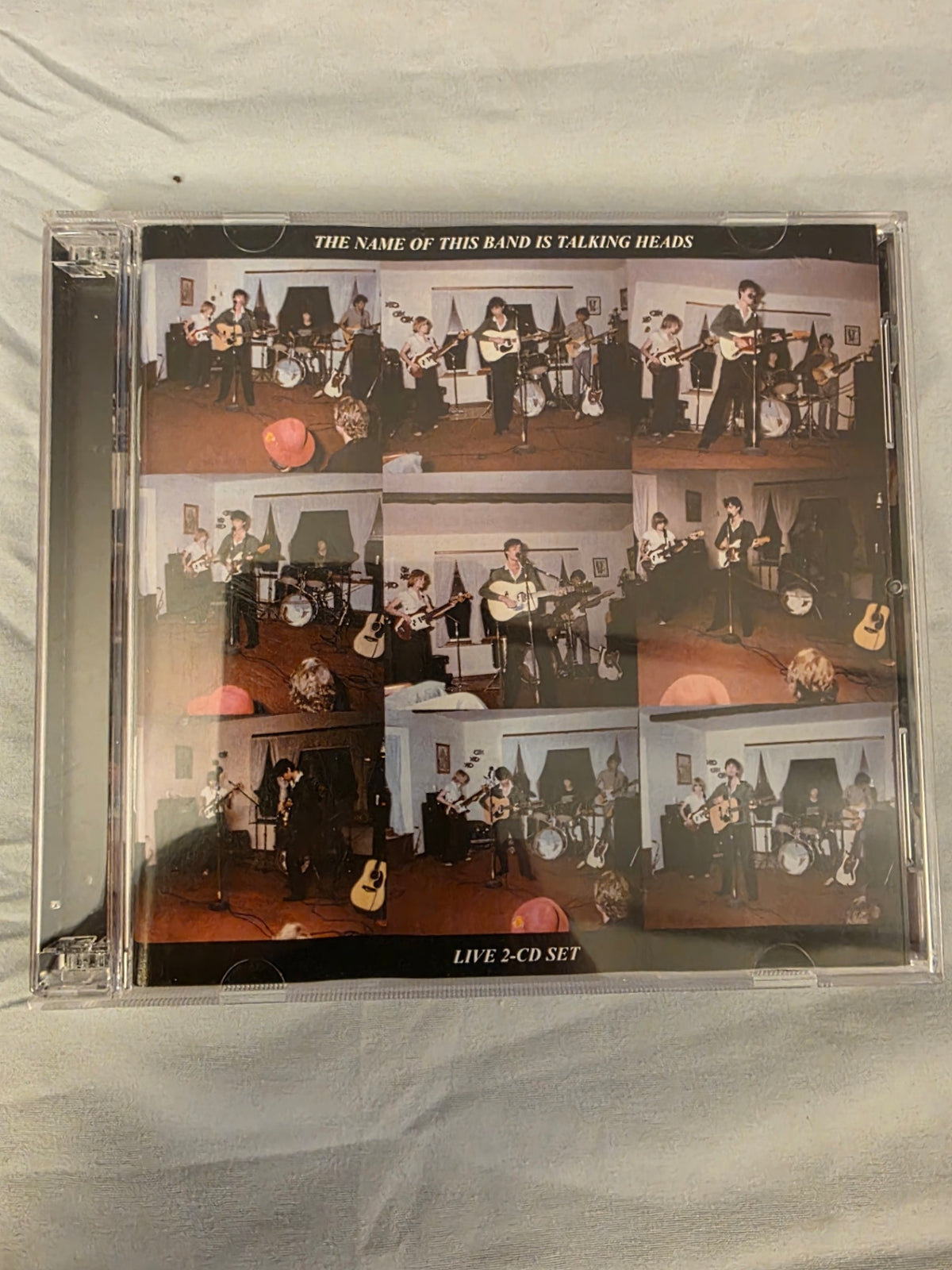 THE NAME OF THE BAND IS 'TALKING HEADS'.
