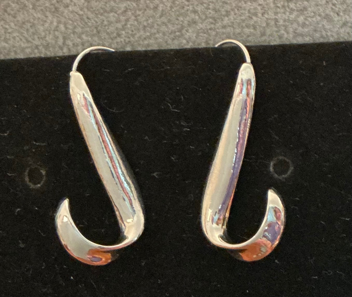 Silver-tone curved earrings