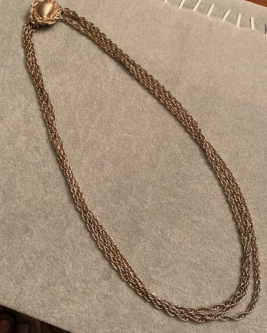 Multi-strand gold tone necklace