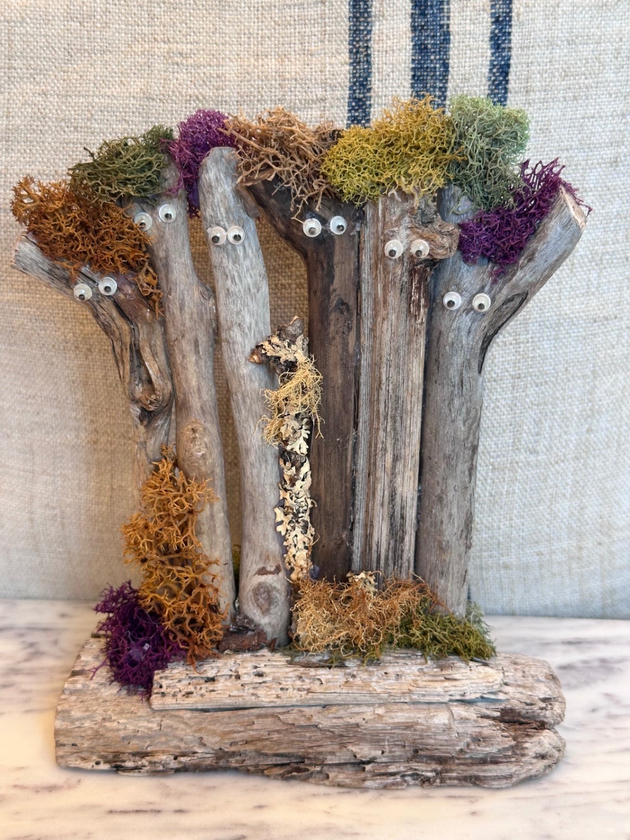 Vintage driftwood and moss figurine 