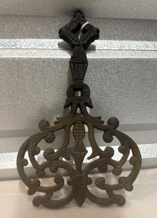 Vintage Wilton cast-iron trivet