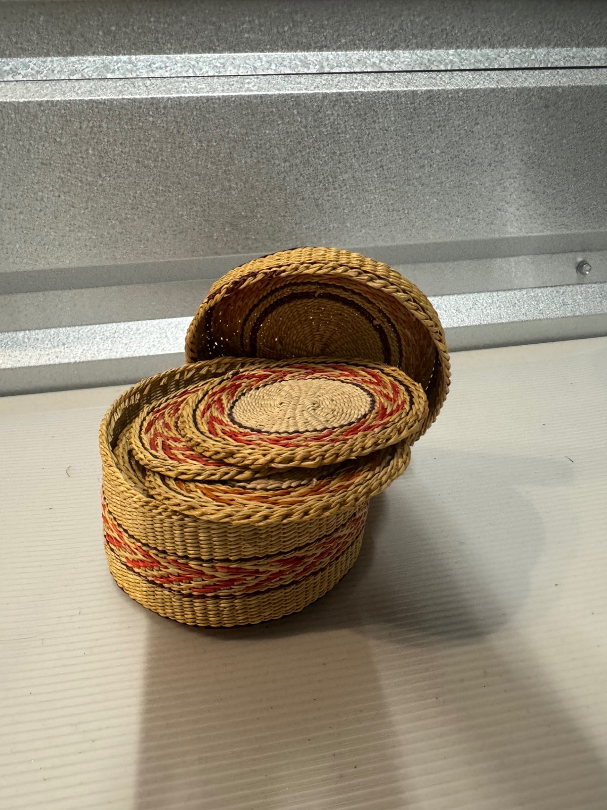 Set of 12 coasters in basket