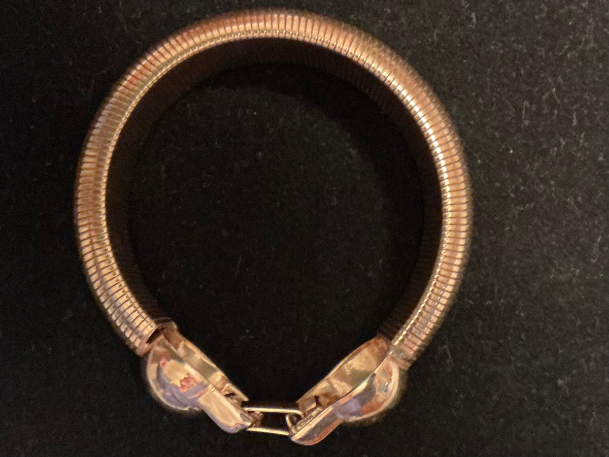 Gold-tone “snake” bracelet 