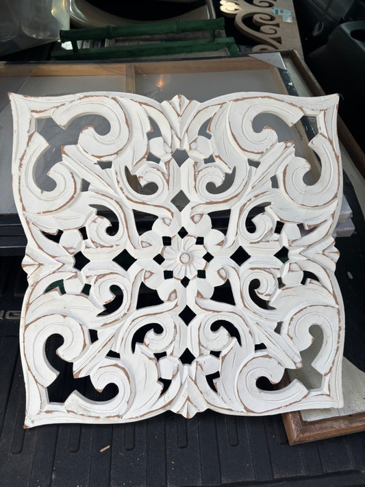 Carved wood wall art