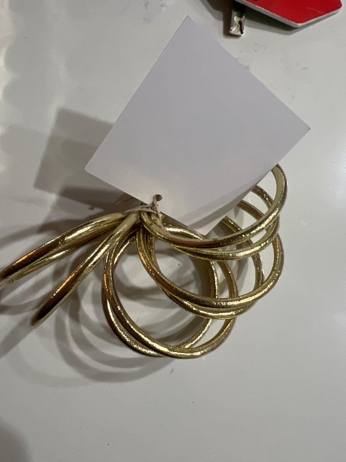 4 gold napkin holders 