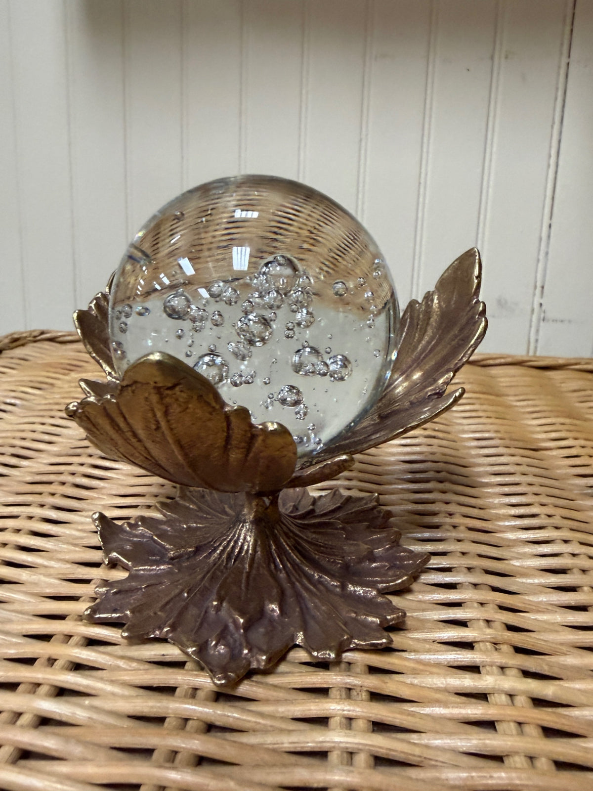 Glass sphere on brass stand