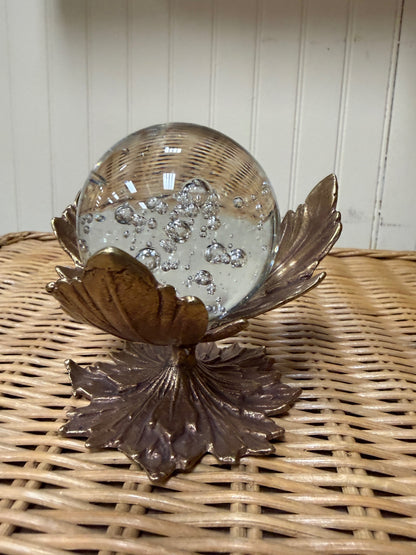 Glass sphere on brass stand