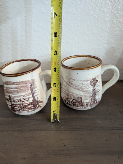 1980 Pair of Enesco "Sky & Plains" Mugs