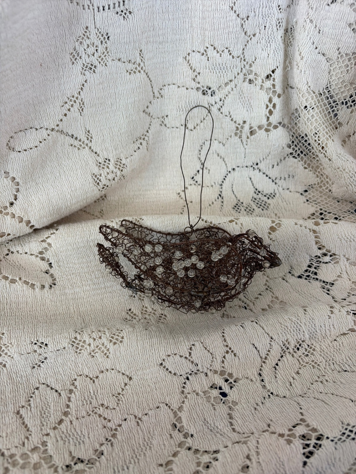 Folk art curly wire beaded bird