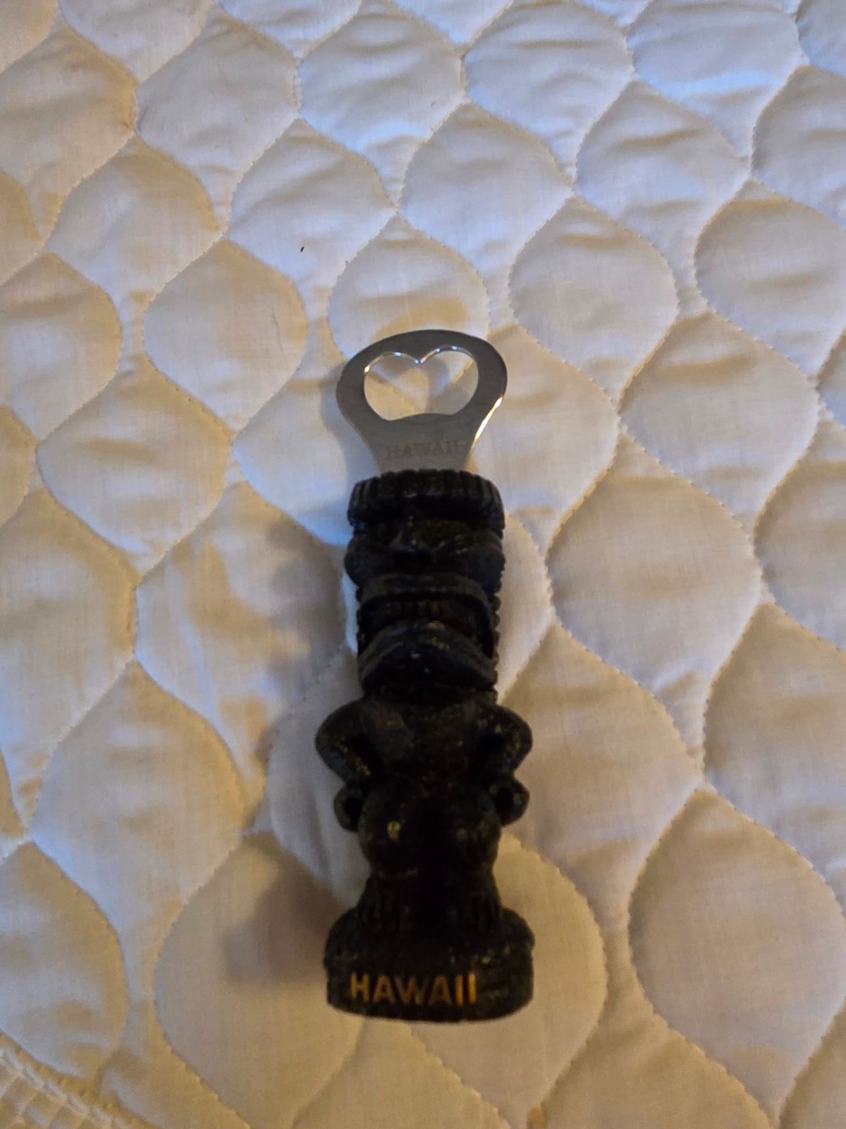 Tiki bottle opener