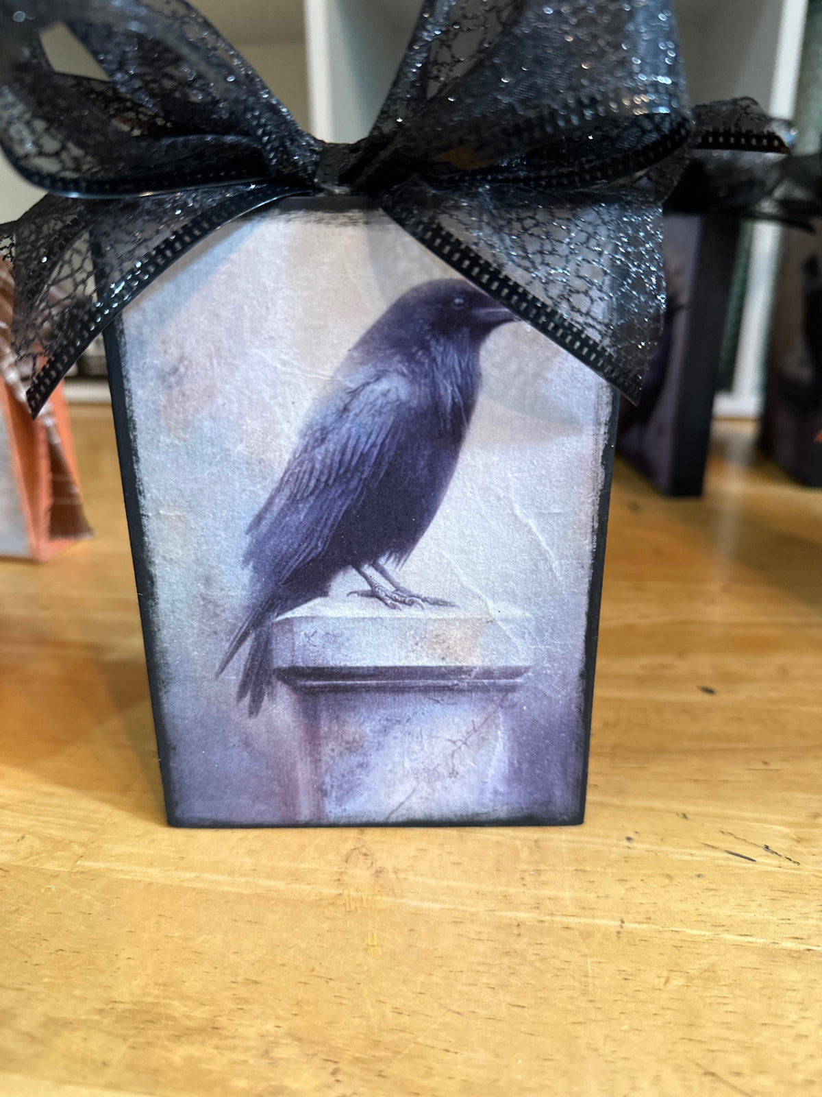 Wood block with raven