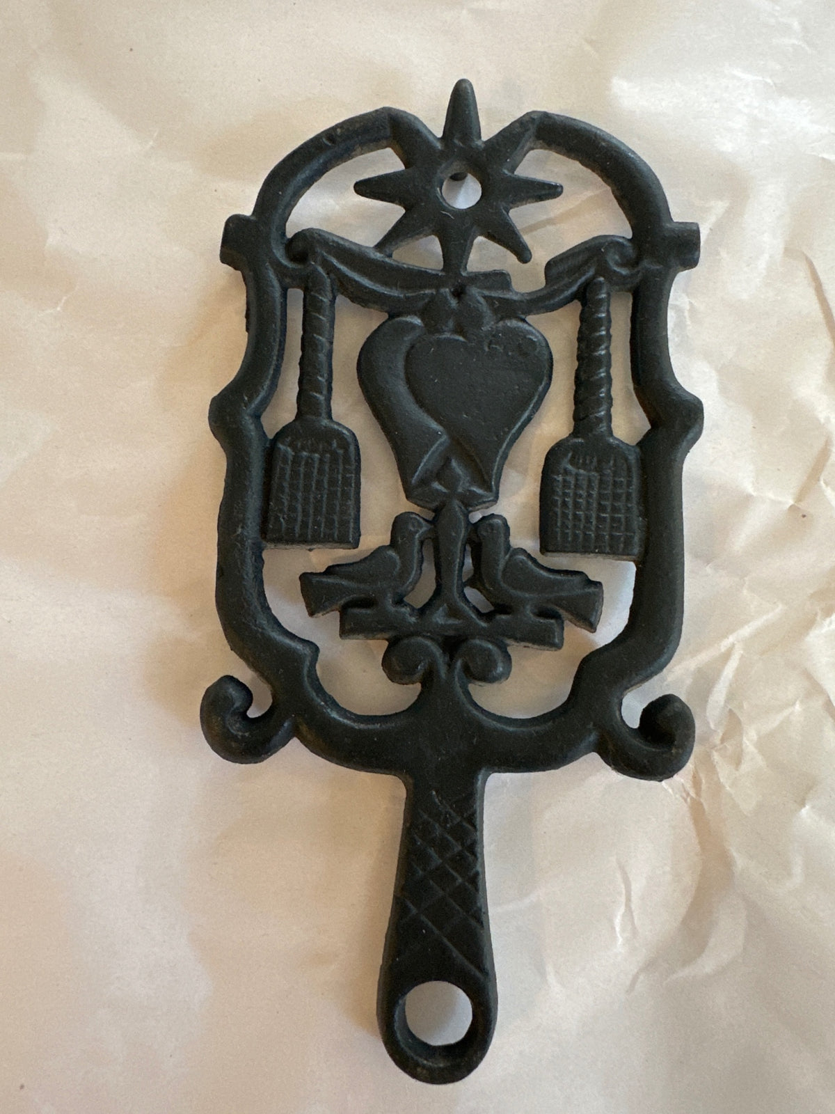 Wilton cast-iron trivet Dutch folk art