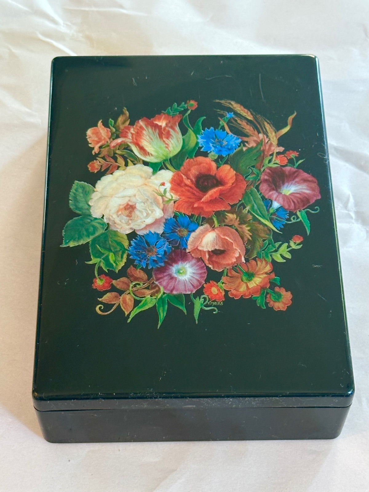 Black box with floral bouquet