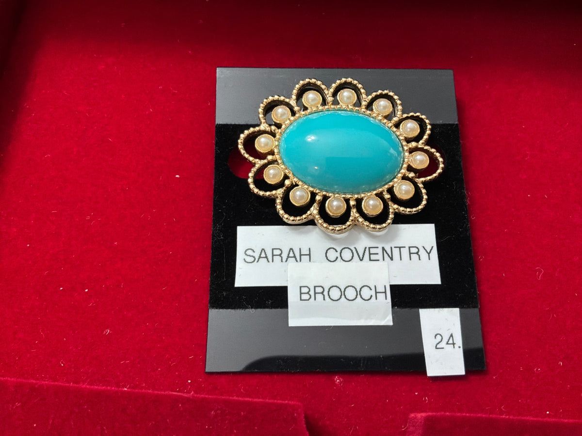 Sarah Coventry oval pearl and blue stone brooch