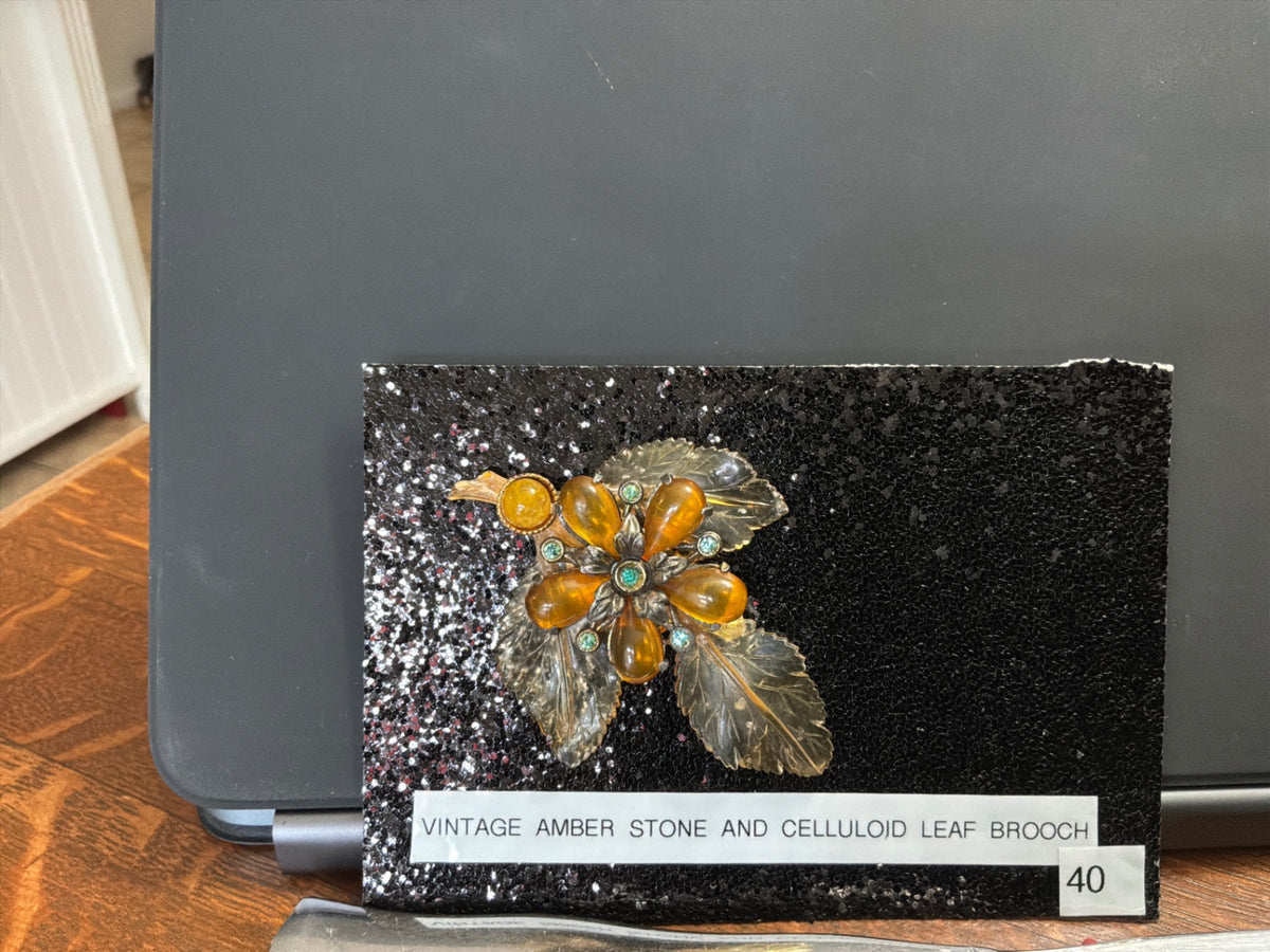 Vintage pin with amber stones and celluloid leaves