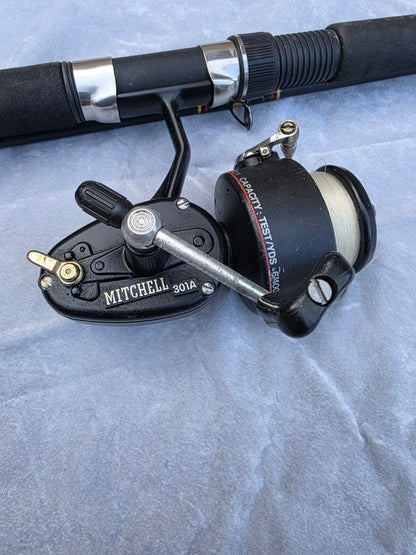 ROD/REEL SPINCAST COMBO WITH A MITCHELL 301 A REEL AND SHAKESPEARE ARSENAL, 8 FT 6 IN ROD.