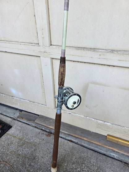 OCEAN TROLLING ROD/REEL COMBO... GARCIA MITCHELL 624 REEL WITH 6 FT 6 IN TROLLING ROD.