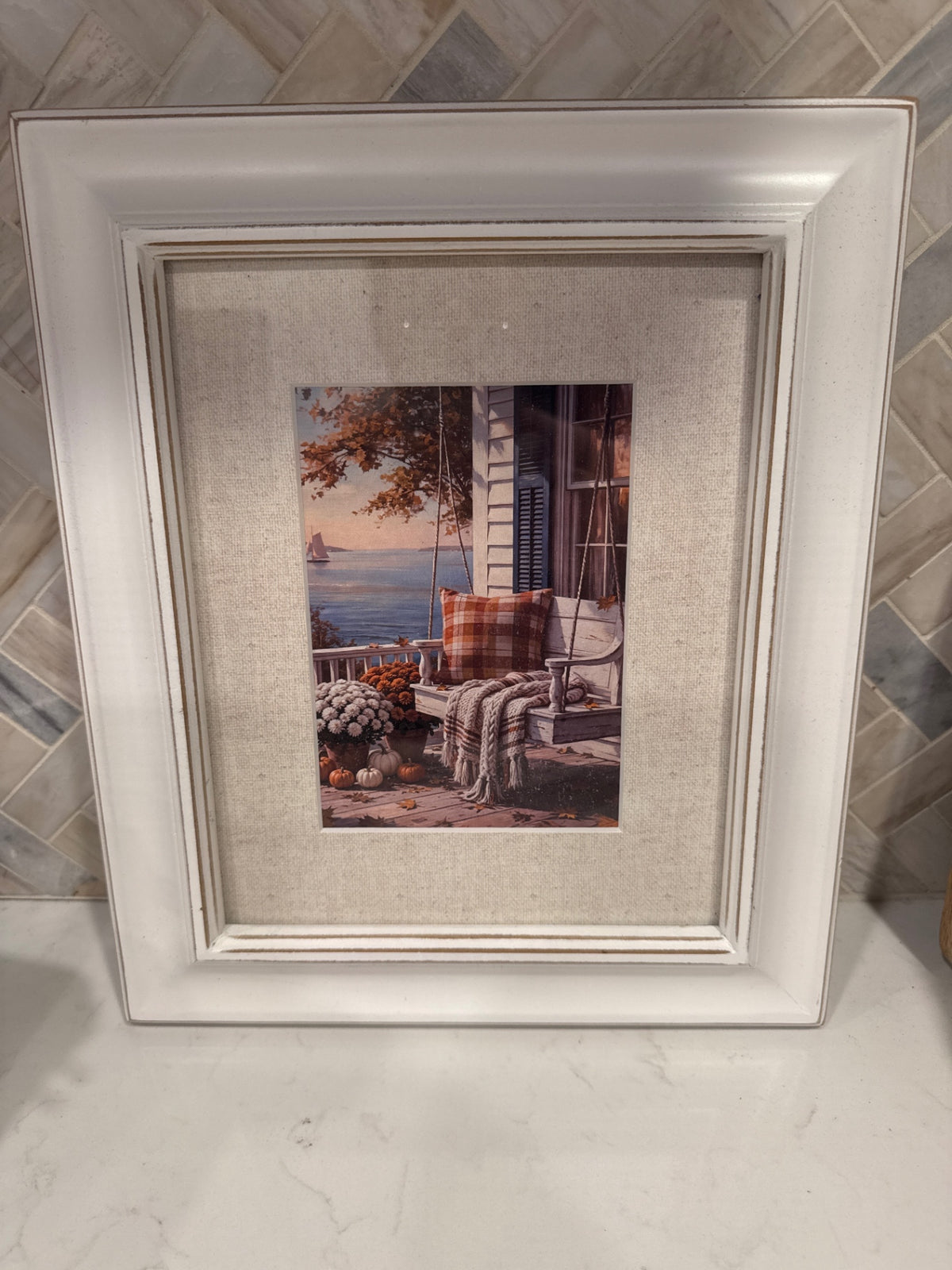 Framed Fall Beachside Porch Swing Print