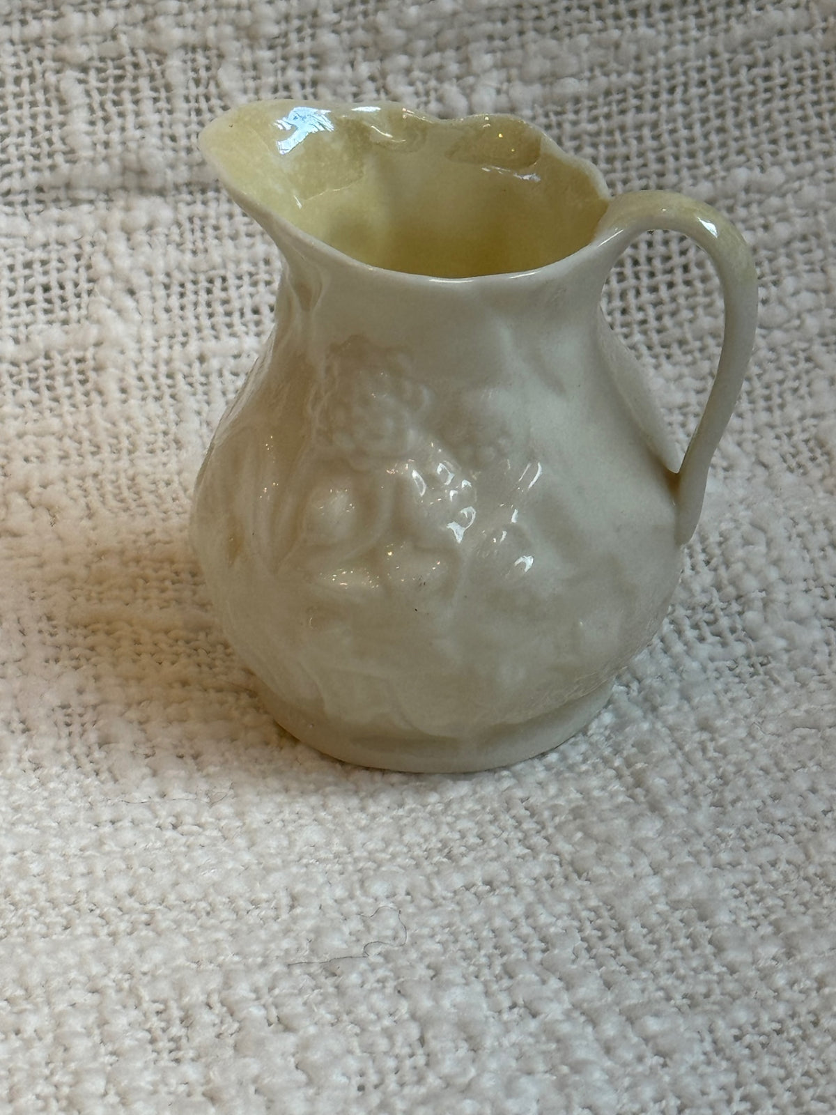 vintage Belleek porcelain creamer in the Lotus pattern